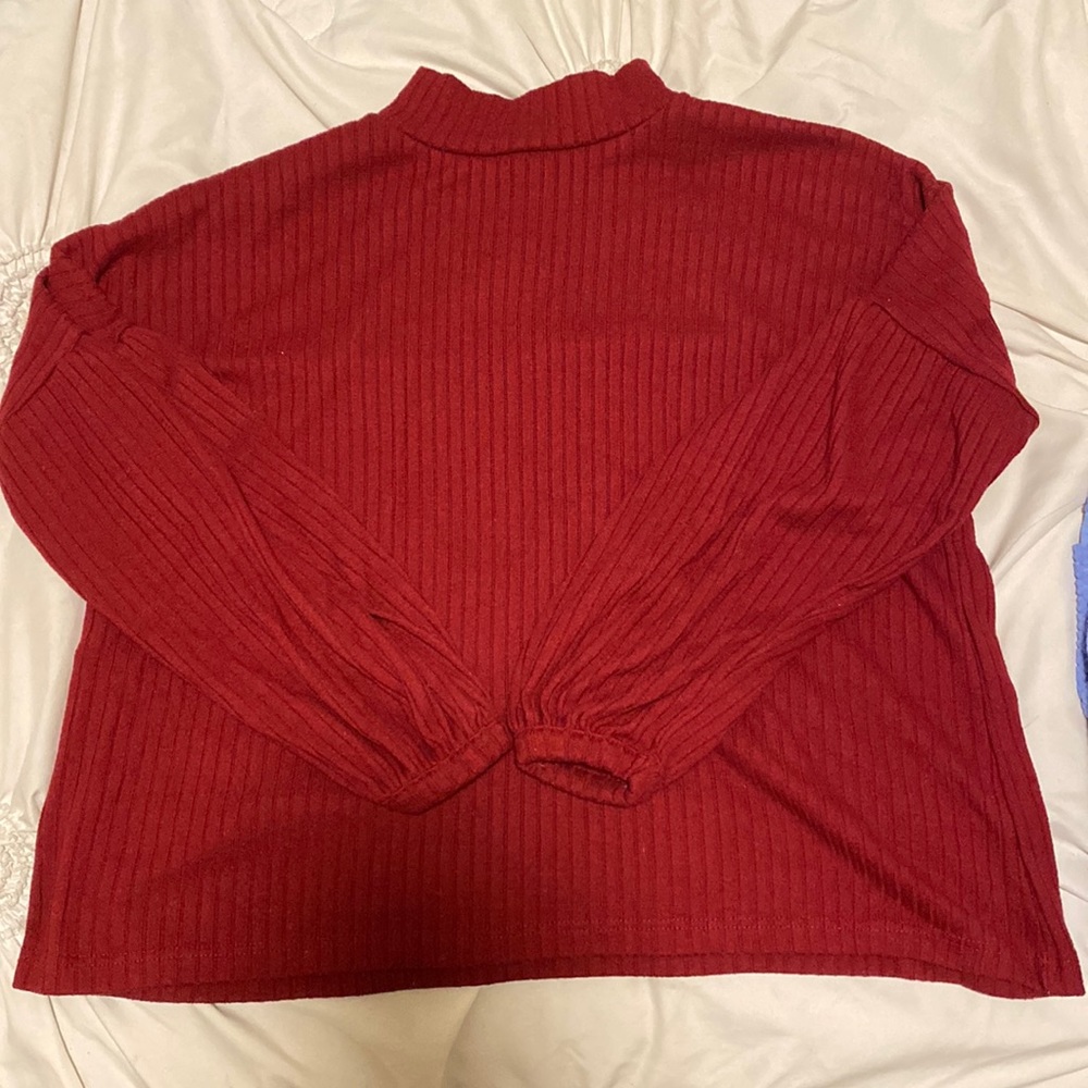 Red turtleneck shirt